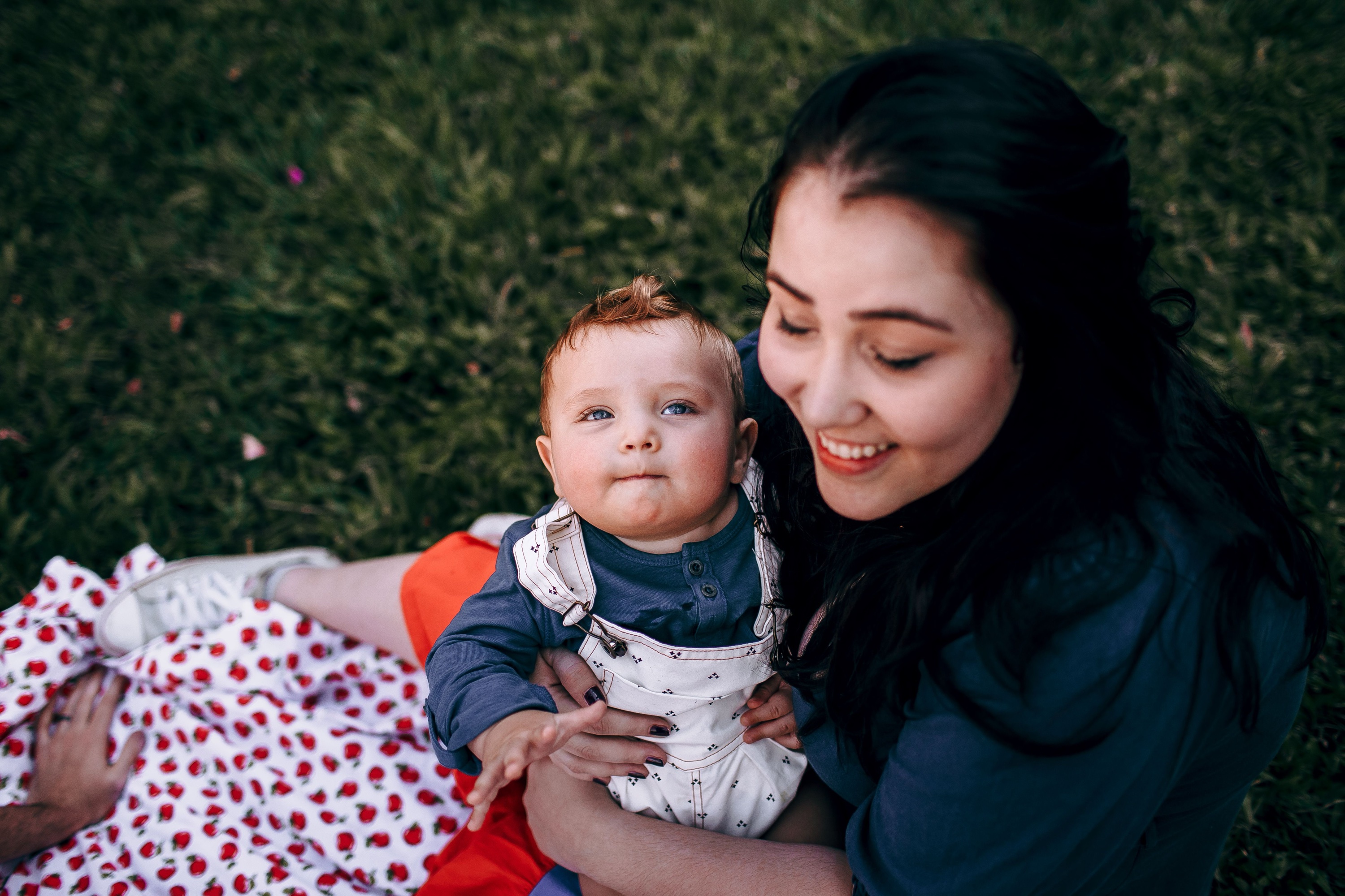 A young mother and her baby spending time together outdoors